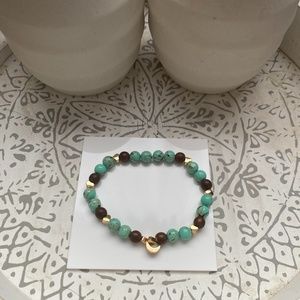 Sea shell beaded bracelet with matte copper hématite